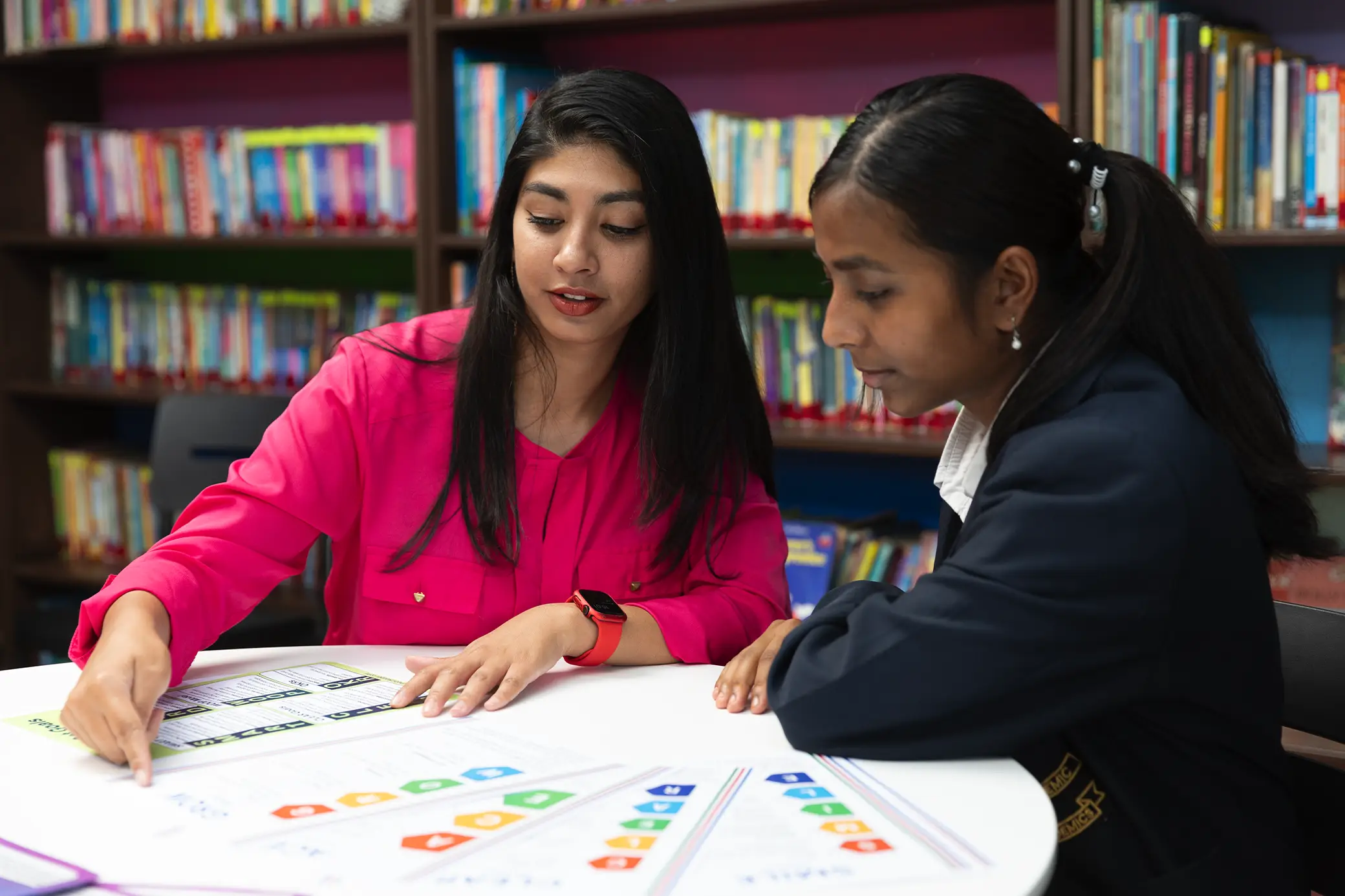 Teacher and student in the library at Summerhill College