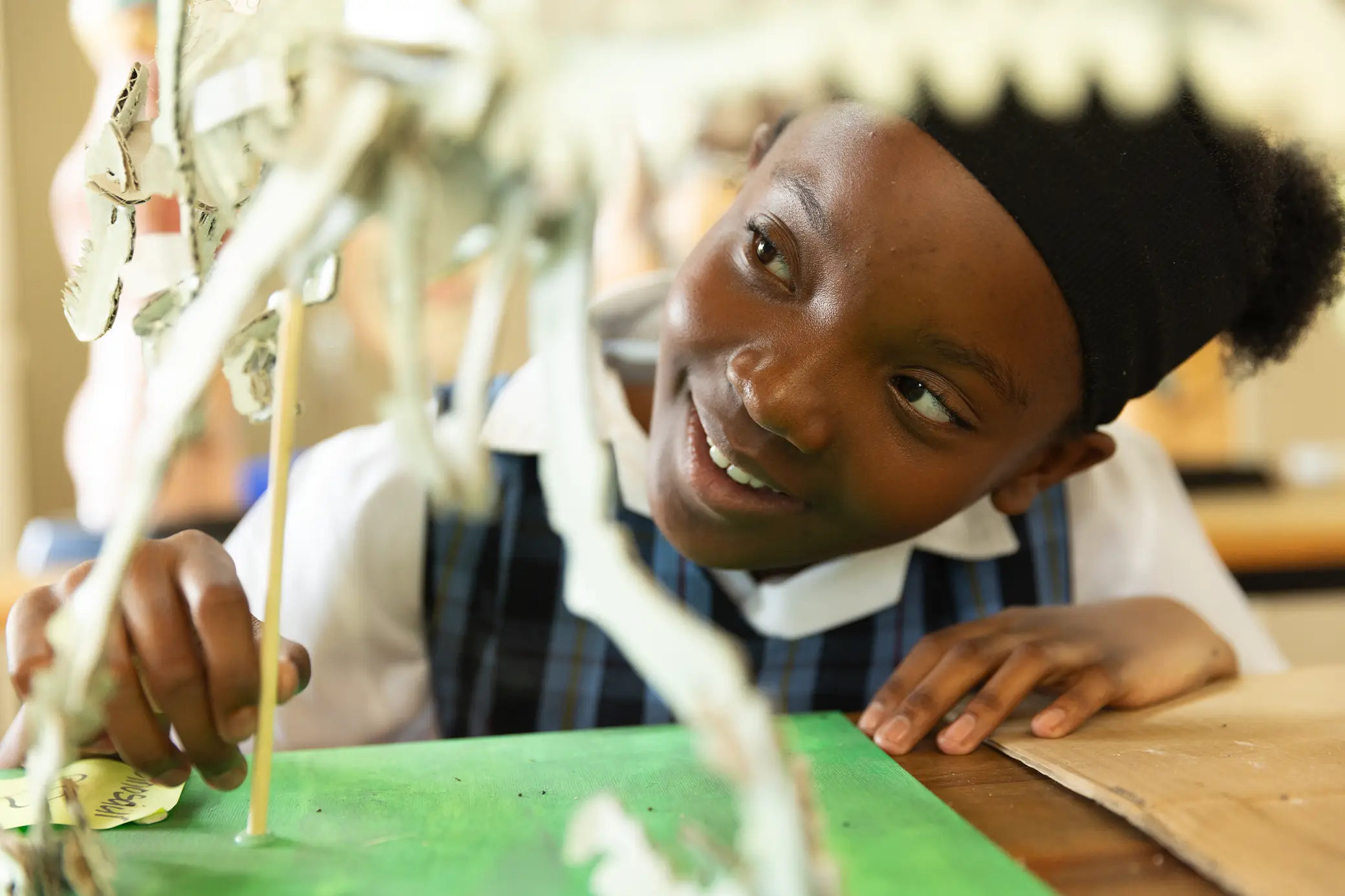Science curiosity — student with skeleton model